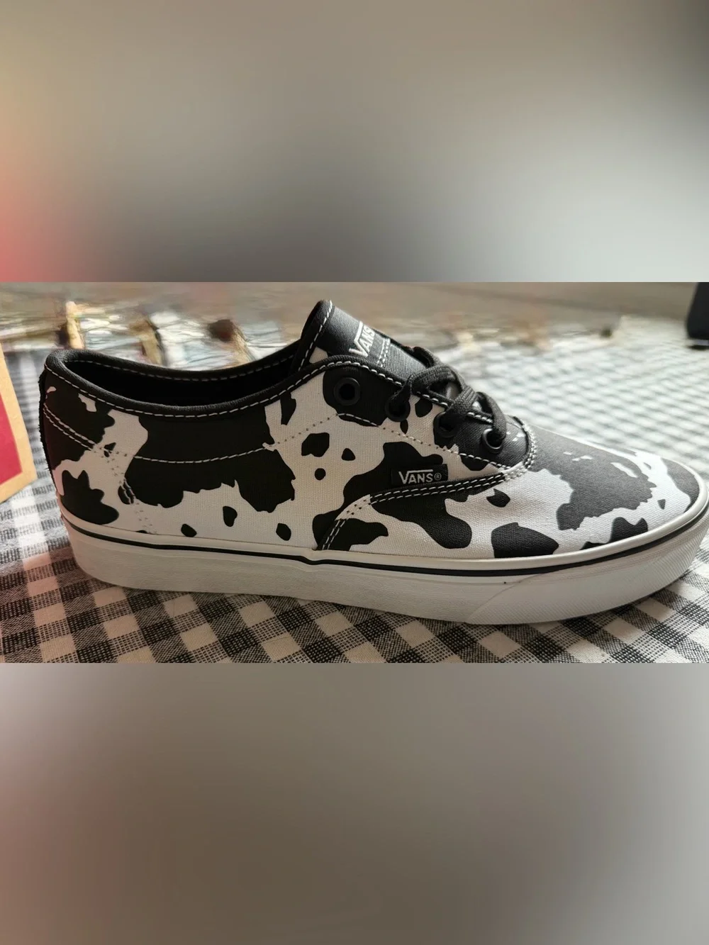 Vans Women’s Cow Print Slip-Ons